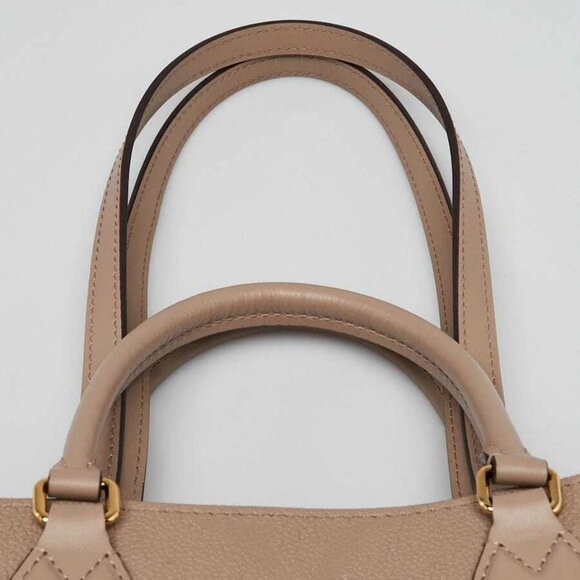 Louis Vuitton Gris Tourterelle Monogram Empreinte Leather Onthego MM Bag - Picture 8 of 9